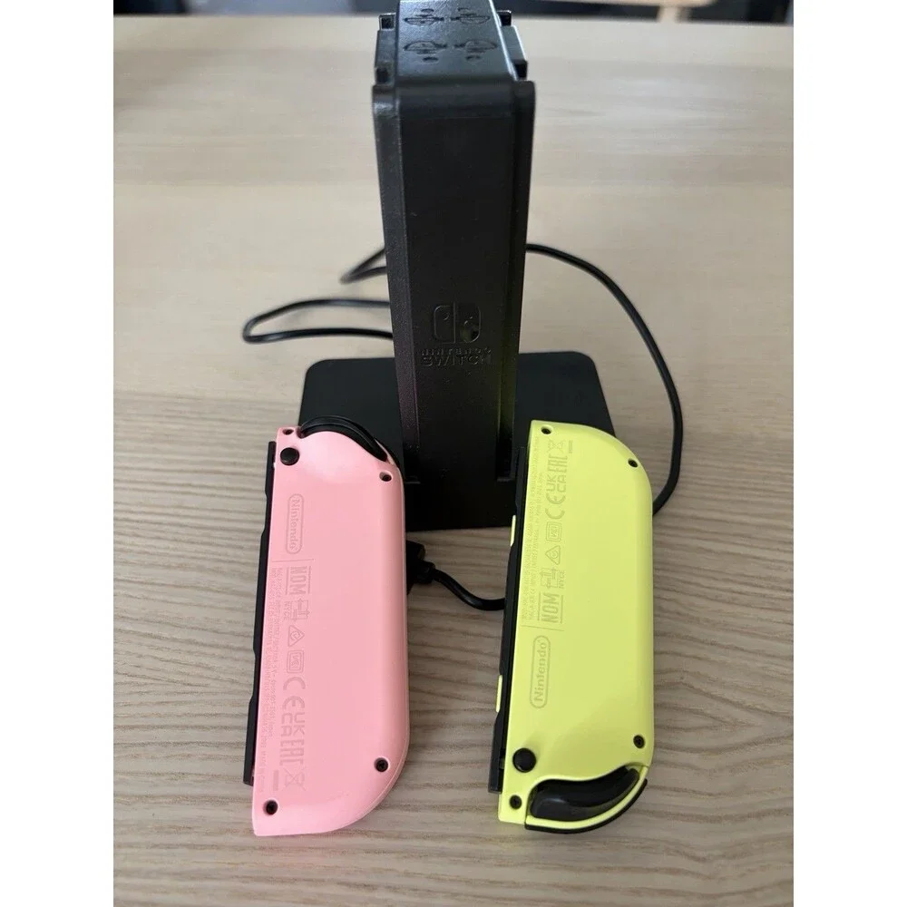 Nintendo Switch Joy-Con Controllers Neon Pink Yellow Charging Dock Wrist Straps